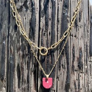 Multi chain necklace with pink pendant paper clip